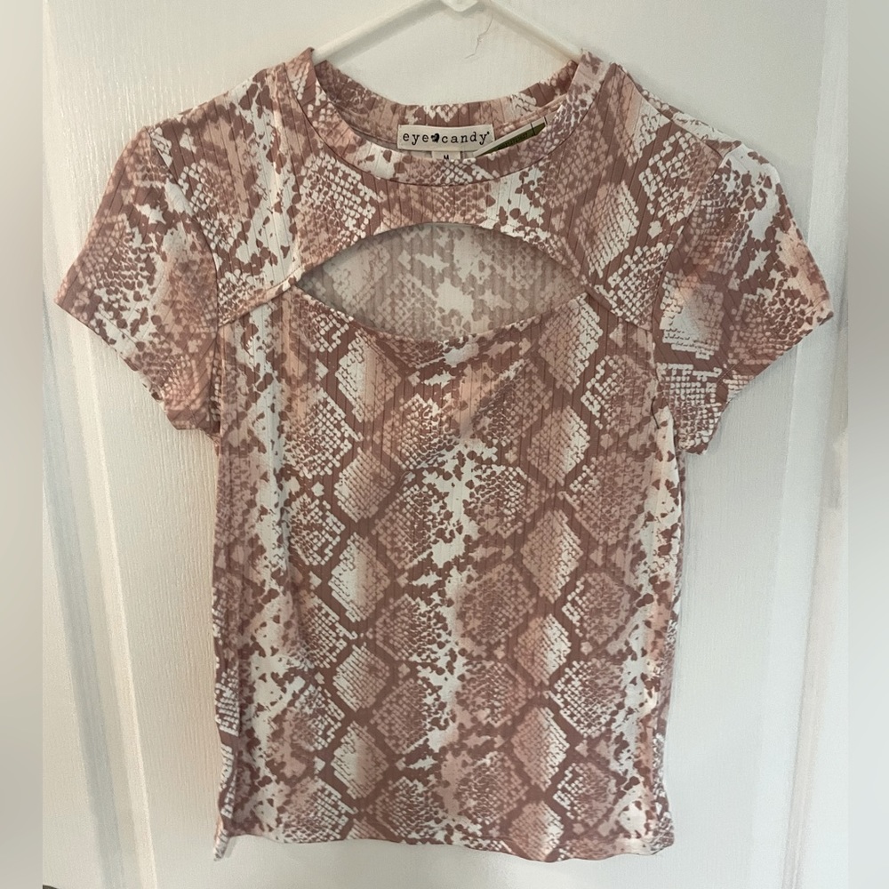 Ladies snakeskin pattern cut out blouse.